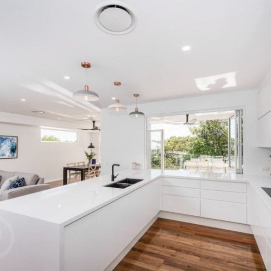 amazing builds kitchen with timber flooring