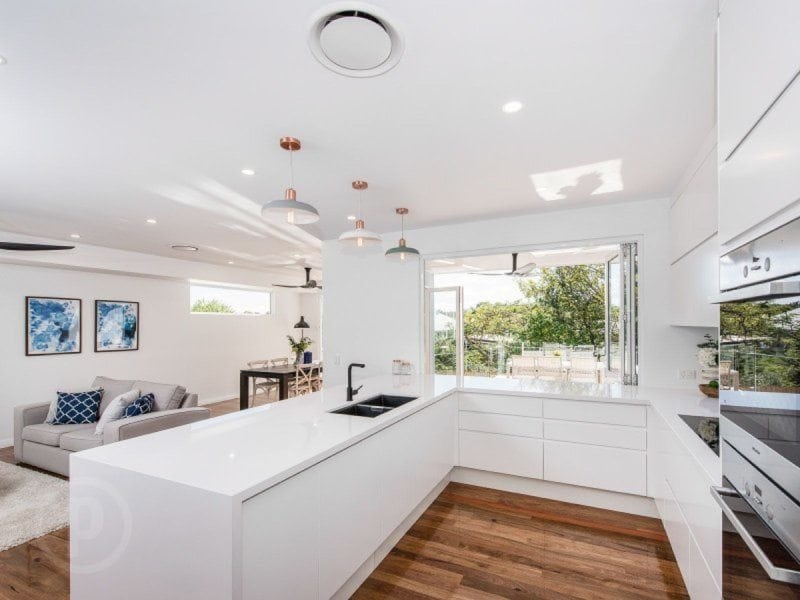 amazing builds kitchen with timber flooring