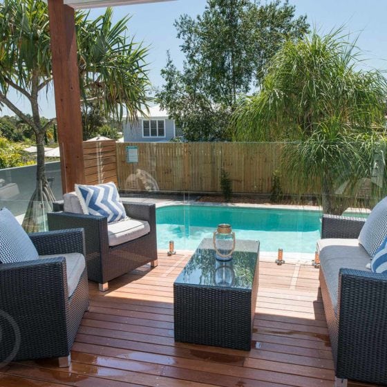 amazing builds back deck overlooking pool