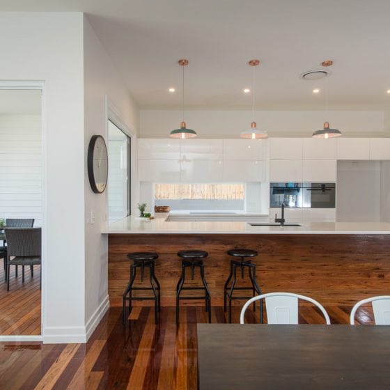 amazing builds kitchen with timber flooring and white walls